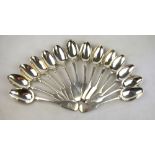 Exeter assay - a Victorian silver matched set of fourteen fiddle pattern dessert spoons - John