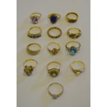 A collection of thirteen various stone set rings including lapis lazuli, opal, garnet and pearl,