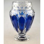 A heavy Art Deco blue overlay cut crystal ovoid vase raised on a cut base, possibly Val St Lambert,