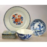 A Chinese Imari plate decorated with flowers and foliage, 22.8 cm to/w a blue and white saucer
