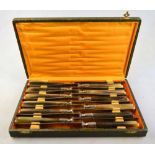 A French Fin de Siecle cased set of twelve table knives,