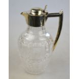 A Victorian cut glass claret jug with silver collar, handle and hinged cover, James Deakin & Sons,