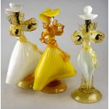 A pair of Murano glass figures in 18th century style Venetian costume, 39 cm to/w a single