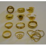 Twelve various gold and yellow metal rings including 9ct half sovereign mount, locket ring etc,