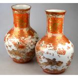 Japanese Meiji Period - a pair of Kutani vases decorated with birds, flowers and foliage, 30 cm (