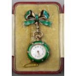 A lady's gilt metal and green enamel fob watch, the bezel set with opalescent beads,