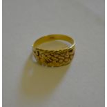 A yellow gold turban style ring stamped 8ct, worn,