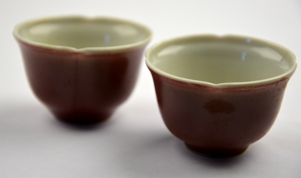 A pair of Chinese copper red wine cups, each with six character marks of Yongzheng but later, 5.2 cm