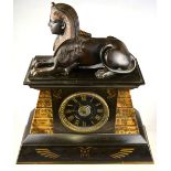 A 19th century Egyptian Revival marble and slate mantel clock,