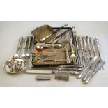 A quantity of flatware and cutlery, some with loaded silver handles, to/w a silver mesh purse,