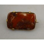 Rectangular moss agate brooch of autumnal tones