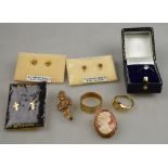 A lot containing an oval shell cameo brooch of female in 9ct rope style mount to/w two 9 ct signet