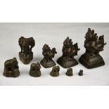 Nine Chinese 19th century bronze weights cast as fabulous animals and elephants, tallest 7.2 cm