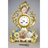 An early 20th century French porcelain mantel clock decorated in relief with mixed flowers,