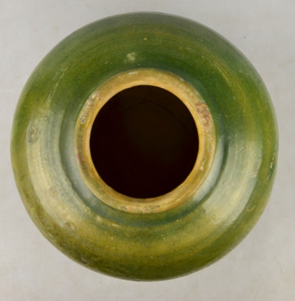 Chinese 11/12th century - a green glazed squat ovoid vase, 18 cm h. Condition Report  Crack to the - Image 2 of 4