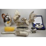 A cased silver ashtray, engraved HMS Britannia 1985, to/w an Art Deco three-piece brush set,