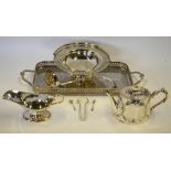 An electroplated galleried tray, fruit basket with swing handle, oval teapot, soup ladle,