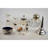 A Victorian silver heavy glass paperweight inkwell with hinged bun cover and spiral reeded body,