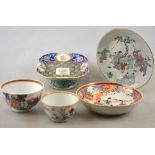 A Chinese 18th century famille rose mandarin palette teabowl and saucer and famille rose teabowl