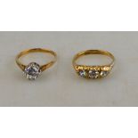A single stone cubic zirconia ring, 9 ct set to/w three stone cubic zirconia ring,