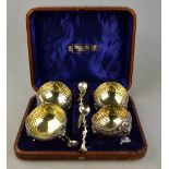 A good quality set of four Victorian silver salts with foliate engraved borders,