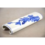 A Chinese blue and white wrist rest decorated with an eagle in a pine tree, 7.5 cm wide x 21.5 cm