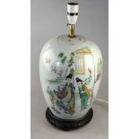 A Chinese early 20th century ovoid famille rose vase and cover decorated with maidens and boys in
