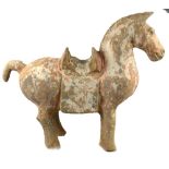 Chinese Han Dynasty 206 BC - 220 AD - a pottery funerary model of a saddled horse,