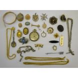 A collection of various antique and jewellery items including lockets, watch chains, brooches,