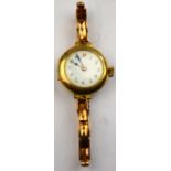 A lady's gilt wristwatch with enamel dial,