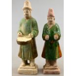 Chinese 10th century AD - Two pottery funerary figures, the larger playing a musical instrument,