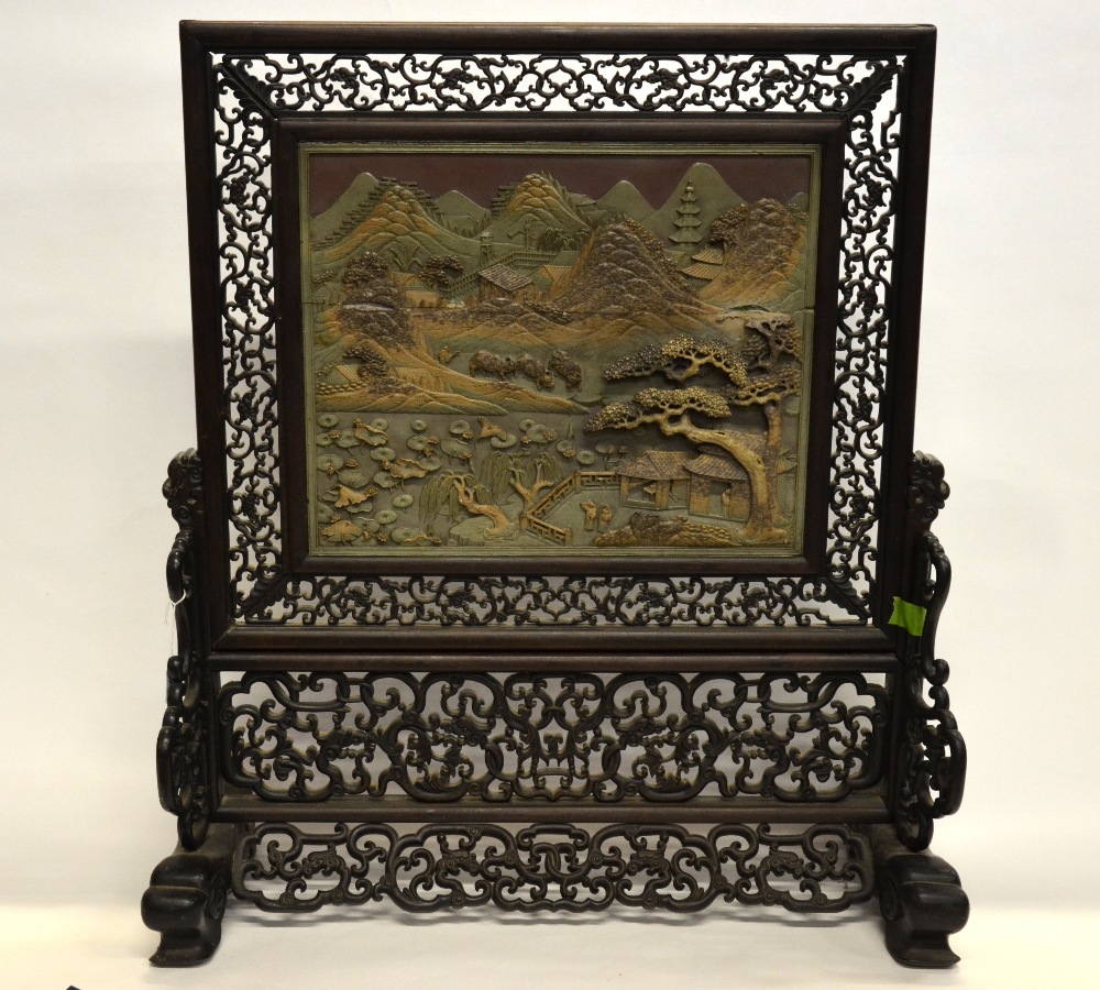 A Chinese 19th century carved hardwood table screen with a rectangular Duan stone panel carved