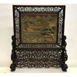 A Chinese 19th century carved hardwood table screen with a rectangular Duan stone panel carved