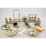 A quantity of silver and other items, including five pepperettes, miniature kettle on stand,