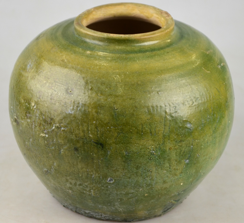 Chinese 11/12th century - a green glazed squat ovoid vase, 18 cm h. Condition Report  Crack to the