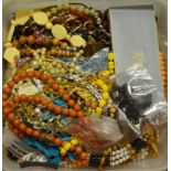 A large quantity of various fashion jewellery including bead and chain necklaces