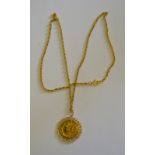 A 1/10 Isle of Man angel coin in scrollwork pendant mount,