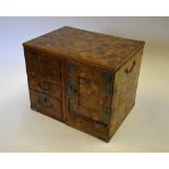 A 19th century Chinese parquetry table cabinet in two sections, one side with four drawers,