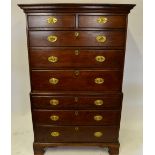 A George III oak chest on chest comprising two short over six long drawers,