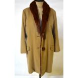 A camel wool coat lined with brown fur and fastened with two fur buttons, 53 cm across chest