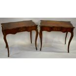A pair of 19th century French ormolu mounted crossbanded and satinwood inlaid walnut tables, the