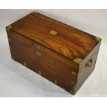 A 19th century brass bound camphorwood campaign chest with carrying handles to sides,