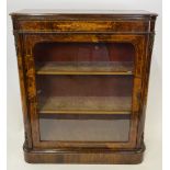 A Victorian ormolu mounted walnut pier cabinet,