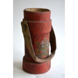A crested red shot bucket with leather handle,
