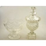 An elegant oval Regency cut glass bowl having a scalloped edge and hobnail cut swags on a facetted