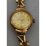 A lady's 9ct gold Rotary wristwatch with gilt dial and 21-jewel Incabloc movement,