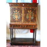 A William & Mary oyster veneered and floral marquetry inlaid cabinet on stand,