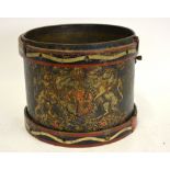 An antique military side-drum, transfer-decorated with a Royal Coat of Arms,