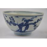 Chinese blue and white bowl decorated with a bird in a flowering tree, four character mark, second