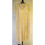 A 1920's natural silk slip dress with mauve trim to neck and sleeves, size 8,